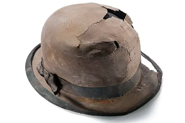 old battered hat in need of restoration